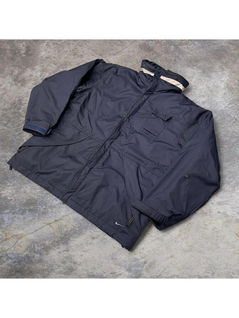 Nike navy blue jacket with hood in zip pocket